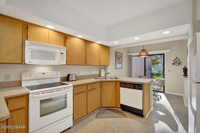 This beautifully maintained three-bedroom, two-bathroom on Spruce Creek Golf Club in Florida - for sale on GolfHomes.com, golf home, golf lot