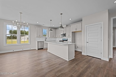 The Coventry welcomes you home. This newly-constructed 3-bedroom on Carolina Colours Golf Club in North Carolina - for sale on GolfHomes.com, golf home, golf lot