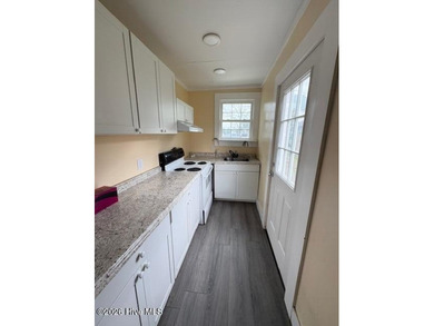 Rarely available income producing property in great Morehead on Brandywine Bay Golf Club in North Carolina - for sale on GolfHomes.com, golf home, golf lot