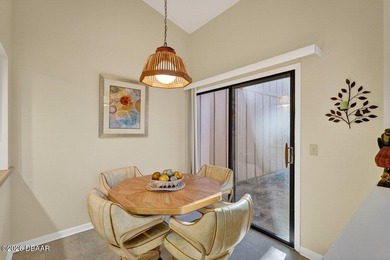 This beautifully maintained three-bedroom, two-bathroom on Spruce Creek Golf Club in Florida - for sale on GolfHomes.com, golf home, golf lot