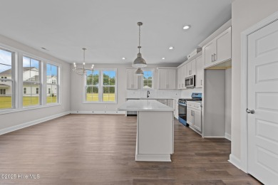 The Coventry welcomes you home. This newly-constructed 3-bedroom on Carolina Colours Golf Club in North Carolina - for sale on GolfHomes.com, golf home, golf lot