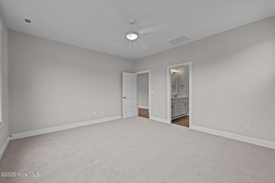 The Coventry welcomes you home. This newly-constructed 3-bedroom on Carolina Colours Golf Club in North Carolina - for sale on GolfHomes.com, golf home, golf lot