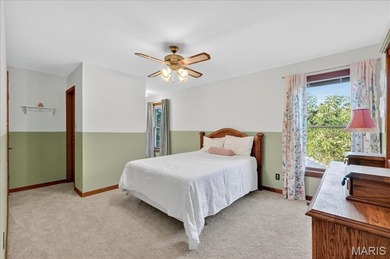 Welcome to 5600 Forest Dr., a stunning 5 bed, 3.5 bath home on 3 on Raintree Country Club in Missouri - for sale on GolfHomes.com, golf home, golf lot