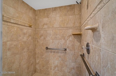 This beautifully maintained three-bedroom, two-bathroom on Spruce Creek Golf Club in Florida - for sale on GolfHomes.com, golf home, golf lot