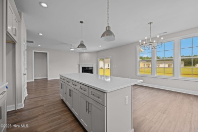The Coventry welcomes you home. This newly-constructed 3-bedroom on Carolina Colours Golf Club in North Carolina - for sale on GolfHomes.com, golf home, golf lot