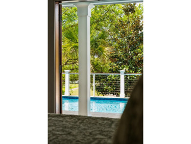 Live at the Beach in this custom built beach house by esteemed on Wild Dunes Harbor Golf Resort in South Carolina - for sale on GolfHomes.com, golf home, golf lot