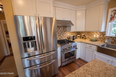 Meticulously maintained and beautifully updated chalet home in on The Hideout Golf in Pennsylvania - for sale on GolfHomes.com, golf home, golf lot