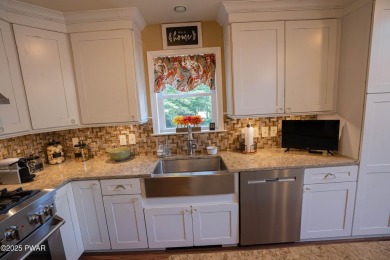 Meticulously maintained and beautifully updated chalet home in on The Hideout Golf in Pennsylvania - for sale on GolfHomes.com, golf home, golf lot