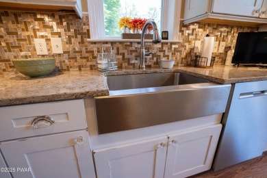 Meticulously maintained and beautifully updated chalet home in on The Hideout Golf in Pennsylvania - for sale on GolfHomes.com, golf home, golf lot
