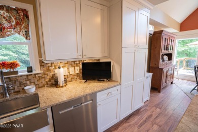 Meticulously maintained and beautifully updated chalet home in on The Hideout Golf in Pennsylvania - for sale on GolfHomes.com, golf home, golf lot