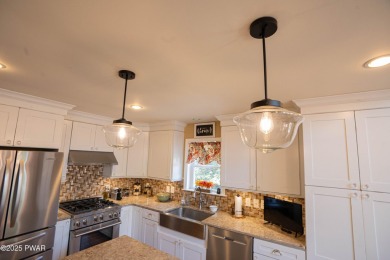 Meticulously maintained and beautifully updated chalet home in on The Hideout Golf in Pennsylvania - for sale on GolfHomes.com, golf home, golf lot
