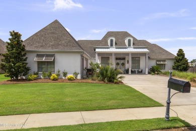 Welcome to 121 Camden Lane - a dreamy waterfront retreat!  This on Lake Caroline Golf Club in Mississippi - for sale on GolfHomes.com, golf home, golf lot