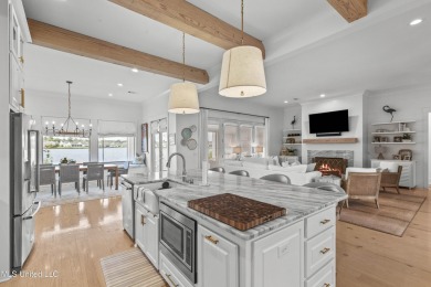 Welcome to 121 Camden Lane - a dreamy waterfront retreat!  This on Lake Caroline Golf Club in Mississippi - for sale on GolfHomes.com, golf home, golf lot