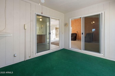 Discover the perfect blend of comfort, convenience, and on Apache Wells Country Club in Arizona - for sale on GolfHomes.com, golf home, golf lot