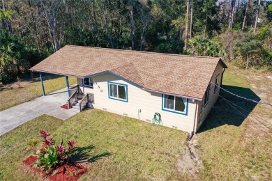 Adorable home on a double lot with tons of privacy. Located on a on Royal St. Augustine Golf and Country Club in Florida - for sale on GolfHomes.com, golf home, golf lot