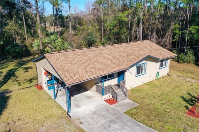 Adorable home on a double lot with tons of privacy. Located on a on Royal St. Augustine Golf and Country Club in Florida - for sale on GolfHomes.com, golf home, golf lot