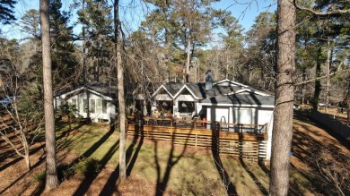 Welcome to 106 Ashford Place in the beautiful, gated swim-tennis on Par 3 West in South Carolina - for sale on GolfHomes.com, golf home, golf lot