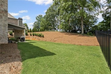 Welcome to this beautiful 5-bedroom, 4-bathroom home located in on Traditions of Braselton Golf Club in Georgia - for sale on GolfHomes.com, golf home, golf lot