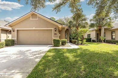This 2 bed 2 bath + Bonus room, single-story end-unit townhome on Plantation Bay Golf and Country Club in Florida - for sale on GolfHomes.com, golf home, golf lot