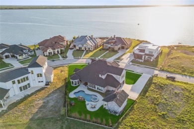 Discover your dream LAKE home on a serene cul-de-sac overlooking on Heath Golf and Yacht Club in Texas - for sale on GolfHomes.com, golf home, golf lot