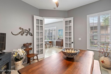 This 2 bed 2 bath + Bonus room, single-story end-unit townhome on Plantation Bay Golf and Country Club in Florida - for sale on GolfHomes.com, golf home, golf lot