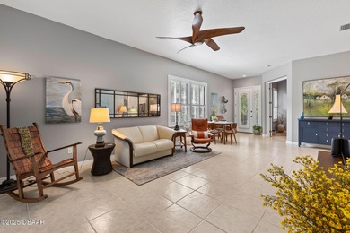 This 2 bed 2 bath + Bonus room, single-story end-unit townhome on Plantation Bay Golf and Country Club in Florida - for sale on GolfHomes.com, golf home, golf lot