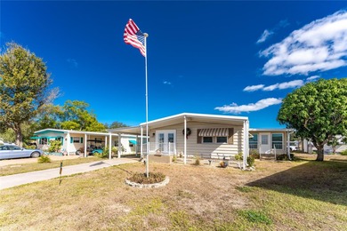 Totally updated, upgraded 2 bed/2 bath manufactured home on on Sabal Trace Golf and Country Club in Florida - for sale on GolfHomes.com, golf home, golf lot
