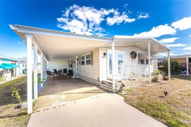 Totally updated, upgraded 2 bed/2 bath manufactured home on on Sabal Trace Golf and Country Club in Florida - for sale on GolfHomes.com, golf home, golf lot