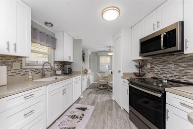 Totally updated, upgraded 2 bed/2 bath manufactured home on on Sabal Trace Golf and Country Club in Florida - for sale on GolfHomes.com, golf home, golf lot