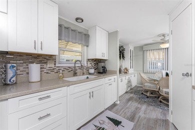 Totally updated, upgraded 2 bed/2 bath manufactured home on on Sabal Trace Golf and Country Club in Florida - for sale on GolfHomes.com, golf home, golf lot