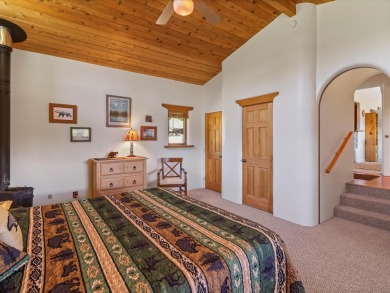 Welcome to The Great Escape, a desirable 3BR/2BA alpine home on El Valle Escondido Golf Course in New Mexico - for sale on GolfHomes.com, golf home, golf lot