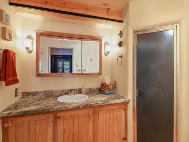 Welcome to The Great Escape, a desirable 3BR/2BA alpine home on El Valle Escondido Golf Course in New Mexico - for sale on GolfHomes.com, golf home, golf lot
