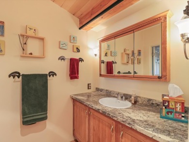 Welcome to The Great Escape, a desirable 3BR/2BA alpine home on El Valle Escondido Golf Course in New Mexico - for sale on GolfHomes.com, golf home, golf lot