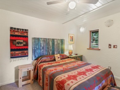 Welcome to The Great Escape, a desirable 3BR/2BA alpine home on El Valle Escondido Golf Course in New Mexico - for sale on GolfHomes.com, golf home, golf lot