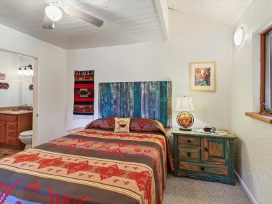 Welcome to The Great Escape, a desirable 3BR/2BA alpine home on El Valle Escondido Golf Course in New Mexico - for sale on GolfHomes.com, golf home, golf lot