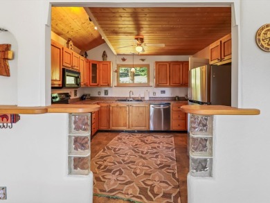 Welcome to The Great Escape, a desirable 3BR/2BA alpine home on El Valle Escondido Golf Course in New Mexico - for sale on GolfHomes.com, golf home, golf lot