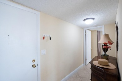 Rarely available 3rd floor, corner, southeast-facing condo with on Ocean Palm Golf Course in Florida - for sale on GolfHomes.com, golf home, golf lot