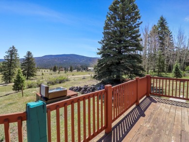 Welcome to The Great Escape, a desirable 3BR/2BA alpine home on El Valle Escondido Golf Course in New Mexico - for sale on GolfHomes.com, golf home, golf lot