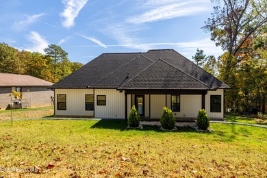 Tucked away on a peaceful cul-de-sac in Tellico Village's on Toqua Golf Course - Loudon County in Tennessee - for sale on GolfHomes.com, golf home, golf lot