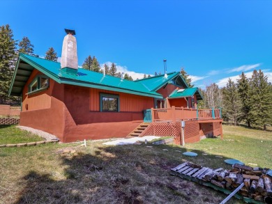 Welcome to The Great Escape, a desirable 3BR/2BA alpine home on El Valle Escondido Golf Course in New Mexico - for sale on GolfHomes.com, golf home, golf lot