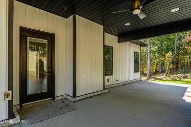 Tucked away on a peaceful cul-de-sac in Tellico Village's on Toqua Golf Course - Loudon County in Tennessee - for sale on GolfHomes.com, golf home, golf lot