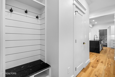 Tucked away on a peaceful cul-de-sac in Tellico Village's on Toqua Golf Course - Loudon County in Tennessee - for sale on GolfHomes.com, golf home, golf lot