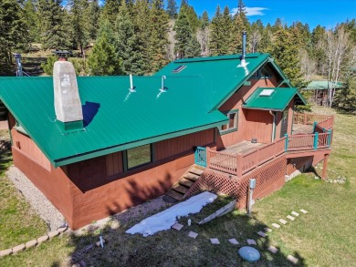 Welcome to The Great Escape, a desirable 3BR/2BA alpine home on El Valle Escondido Golf Course in New Mexico - for sale on GolfHomes.com, golf home, golf lot