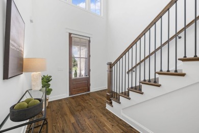 Welcome to 8173 Double Eagle Court, a beautiful home tucked on The Champions Club At Hampton Creek in Tennessee - for sale on GolfHomes.com, golf home, golf lot
