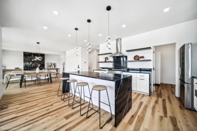 Modern Luxury with Sweeping Panoramic Views! This custom on Eagle Ridge Golf Course in Washington - for sale on GolfHomes.com, golf home, golf lot