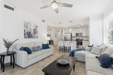 Enjoy carefree Florida living in this exceptional first-floor on Heritage Landing Golf  in Florida - for sale on GolfHomes.com, golf home, golf lot