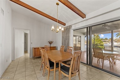 Discover this inviting 3 bedroom, 2 bathroom canalfront home in on Saint Andrews South Golf Club in Florida - for sale on GolfHomes.com, golf home, golf lot