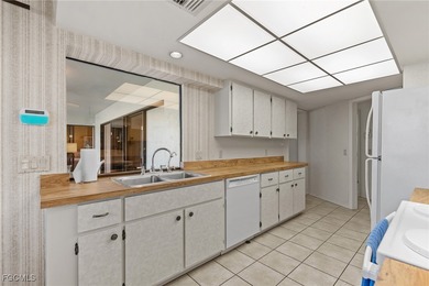 Discover this inviting 3 bedroom, 2 bathroom canalfront home in on Saint Andrews South Golf Club in Florida - for sale on GolfHomes.com, golf home, golf lot