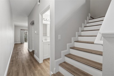 Step into your stunningly updated 2-bedroom, 2.5-bath retreat on Heritage Isles Golf and Country Club in Florida - for sale on GolfHomes.com, golf home, golf lot