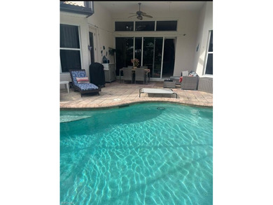 HEATED POOL & SPA WITH CASCADING WATERFALL! Welcome to Belle on Estero Country Club in Florida - for sale on GolfHomes.com, golf home, golf lot